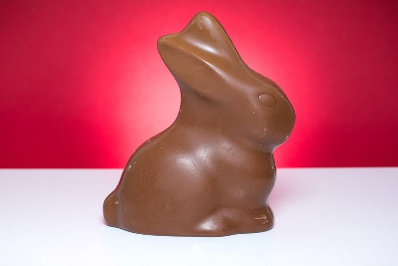 A series of pictures showing a chocolate bunny melting.