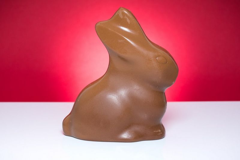 A series of pictures showing a chocolate bunny melting.