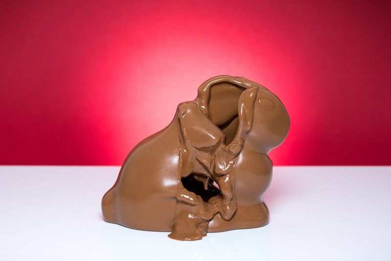 A series of pictures showing a chocolate bunny melting.