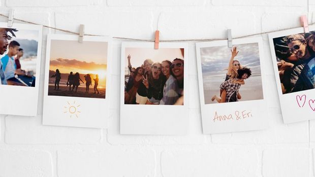 a rope with pegged images with writing on them