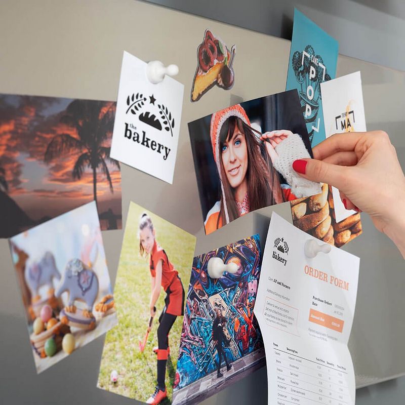 explore your creativity – pictures, and stickers pinned on a board