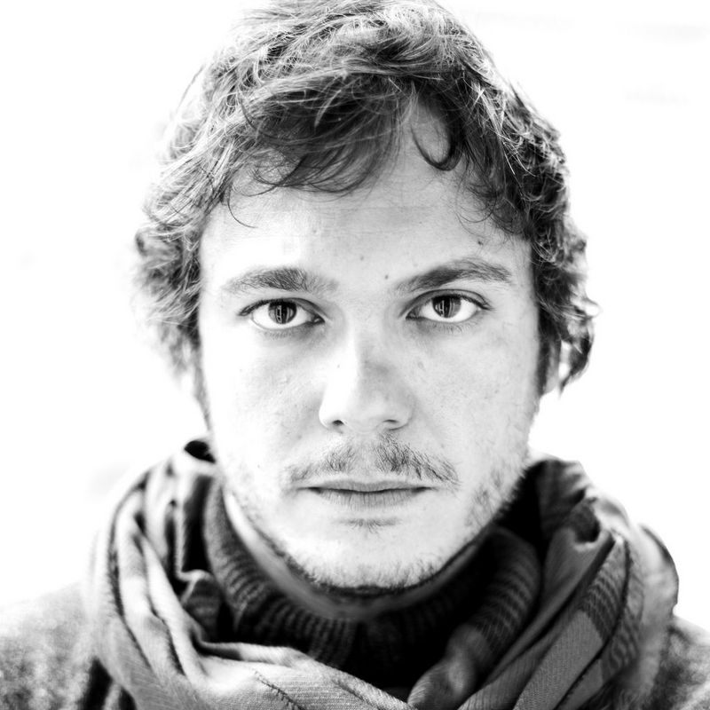A black and white headshot of Canon Ambassador Fabio Bucciarelli.