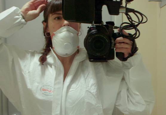 Cinematographer and Canon Video Ambassador Francesca Tosarelli holding a Canon camera.