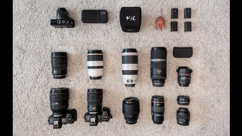 Joel Santos' kitbag containing Canon cameras and lenses, as well as accessories.