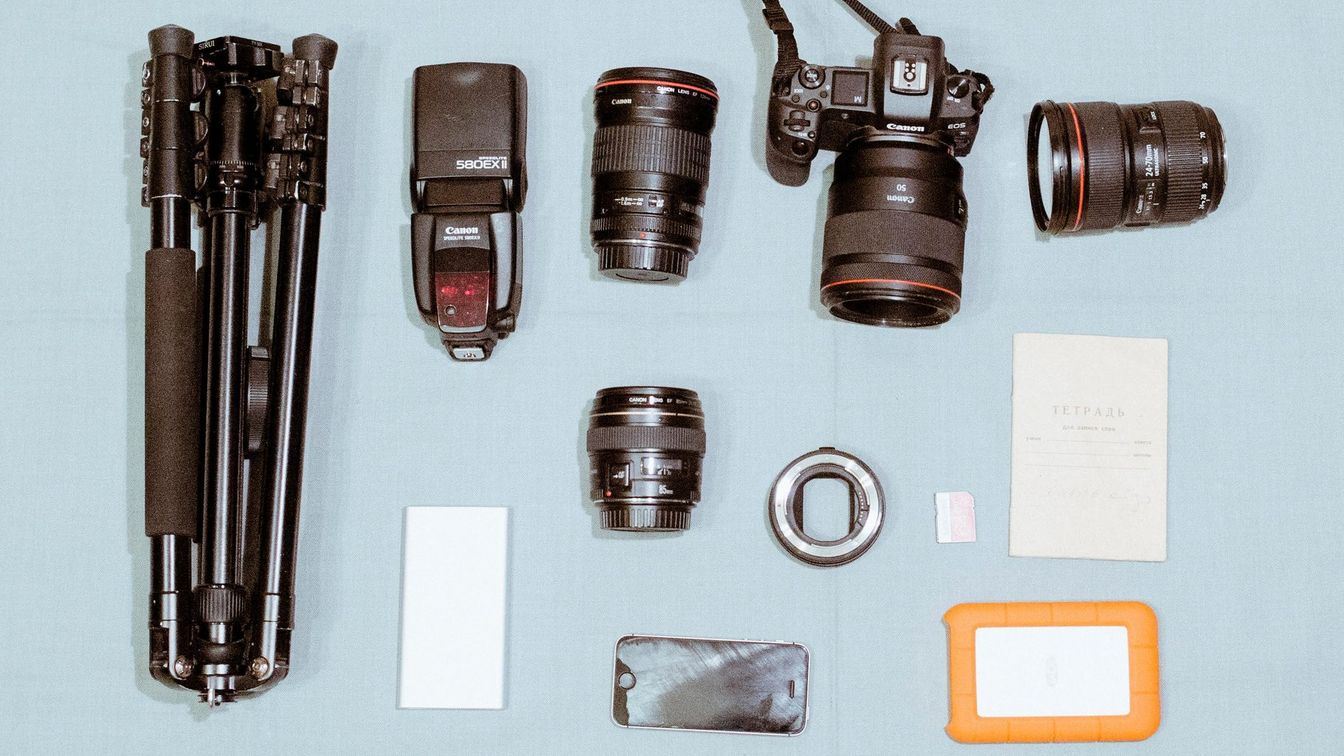 Nanna Heitmann's kitbag containing Canon cameras, lenses and accessories.