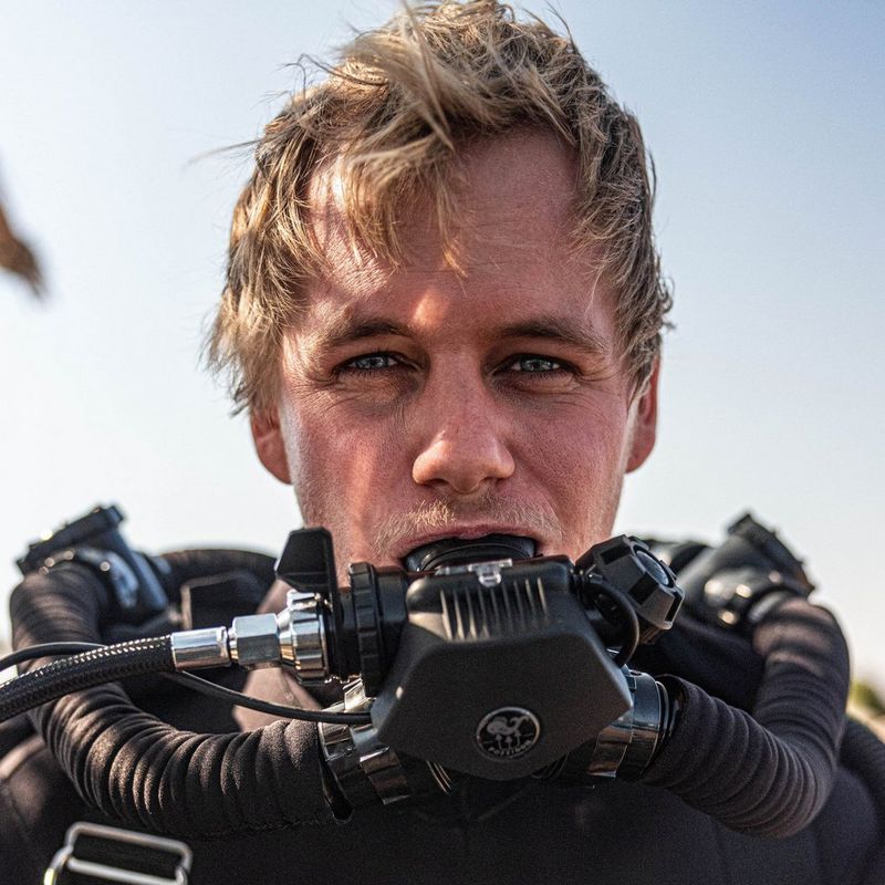 A headshot of filmmaker and Canon Ambassador Nicolai Deutsch wearing diving gear.