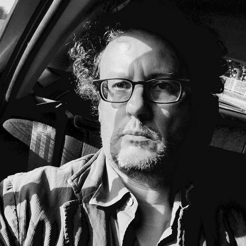 A black-and-white headshot of Canon Ambassador and photojournalist Paolo Pellegrin.