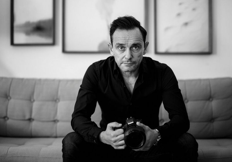 Photographer and Canon Ambassador André Teixeira with a Canon camera.