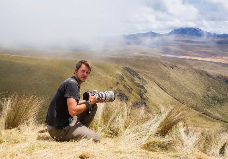 Photographer and Canon Ambassador Maxime Aliaga with his Canon camera. 