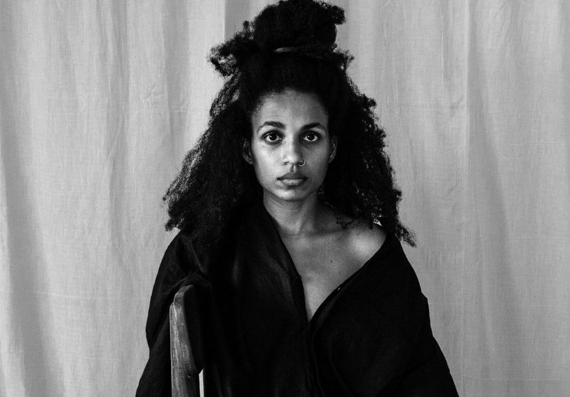 Photographer and Canon Ambassador Yagazie Emezi with her Canon camera.