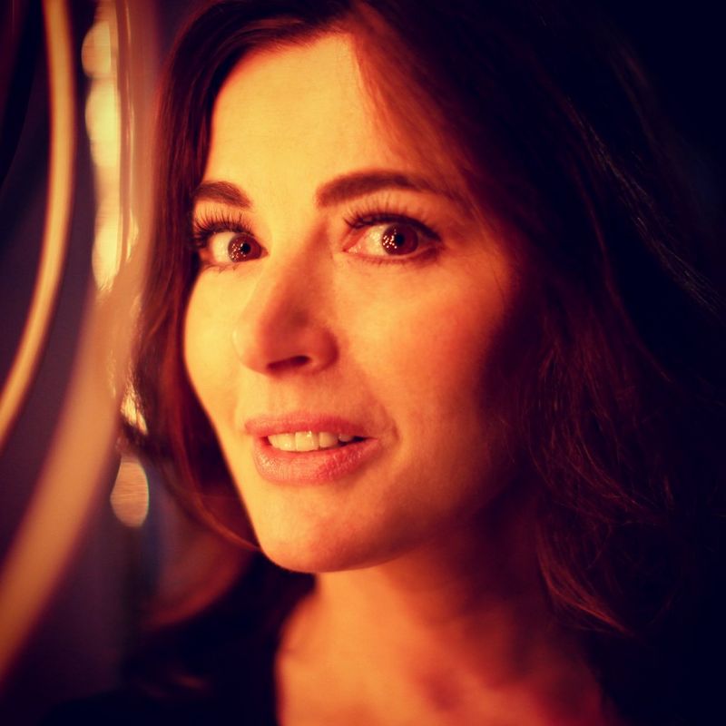 A publicity still by Robin Fox of Nigella Lawson with multiple eye lights.