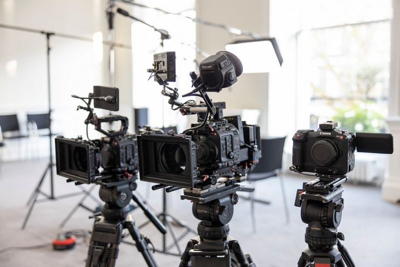 Three Canon Cinema EOS cameras on tripods – an EOS C300 Mark III, an EOS C500 Mark II and an EOS C70.