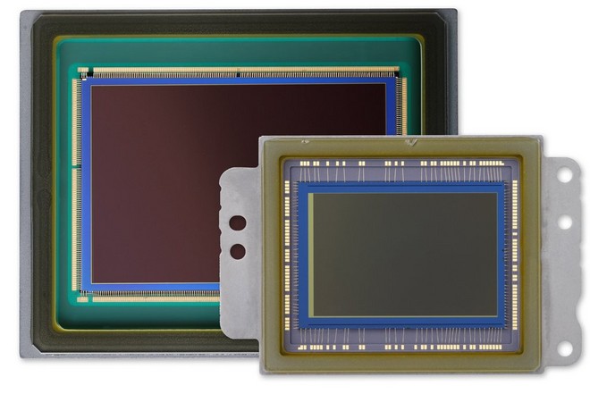 An APS-C sensor in front of a full-frame sensor, showing their relative sizes.