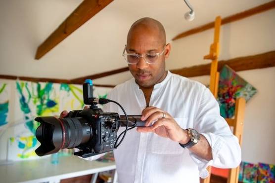 Filmmaker Simeon Quarrie filming with the Canon EOS C70 camera.
