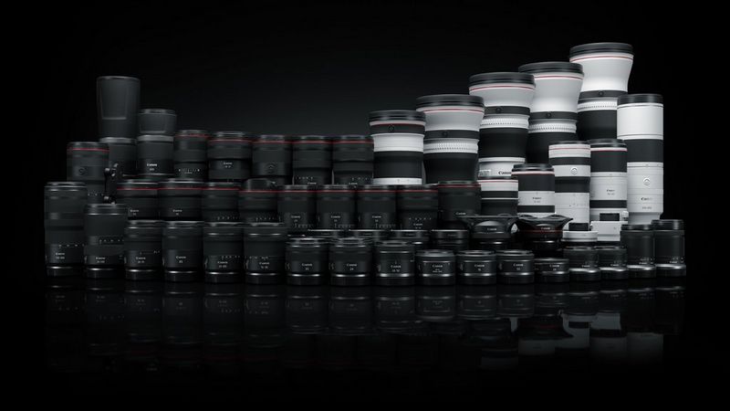 The range of Canon RF and RF-S lenses pictured on a black background.
