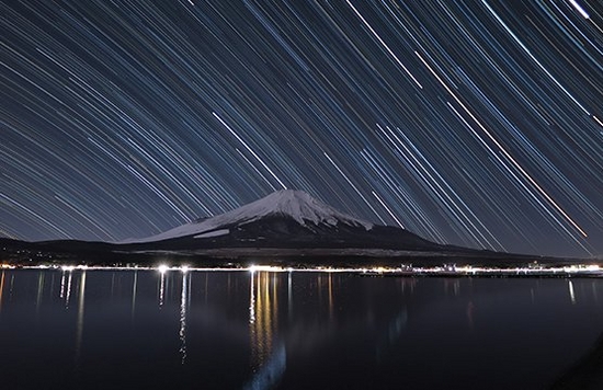 star trails over mountain