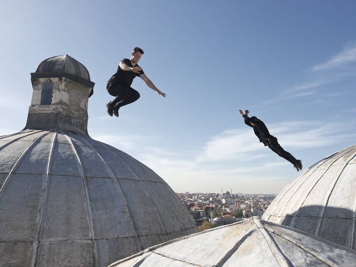 Crossing Continents Storror jumping on Istanbul rooftop