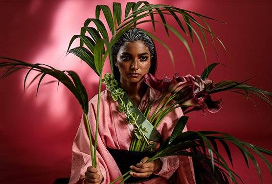 Female wearing kimono and holding plants shot on the Canon EOS R & RF 50mm f/1.2L USM