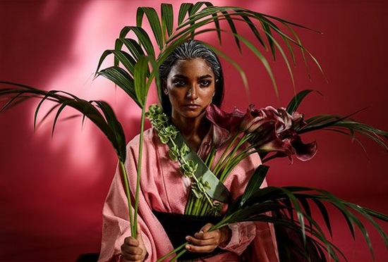 Female wearing kimono and holding plants shot on the Canon EOS R & RF 50mm F1.2L USM