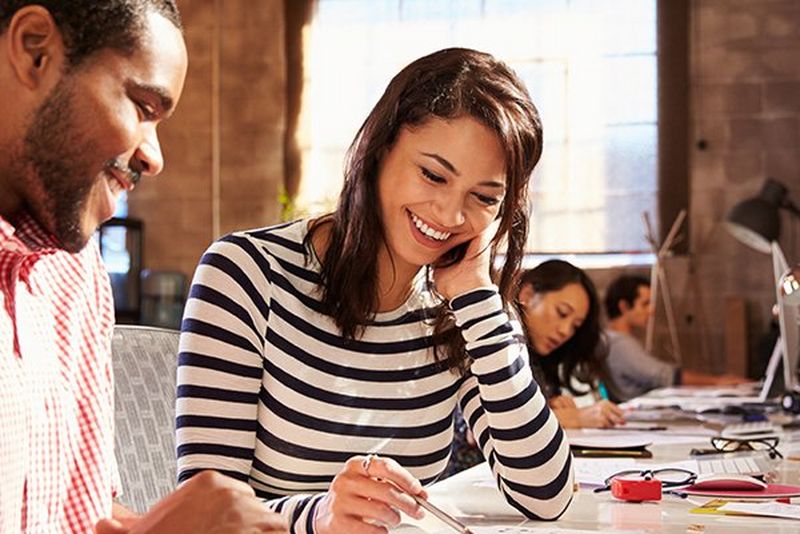 work-team-desk-reviewing-documents-small-block