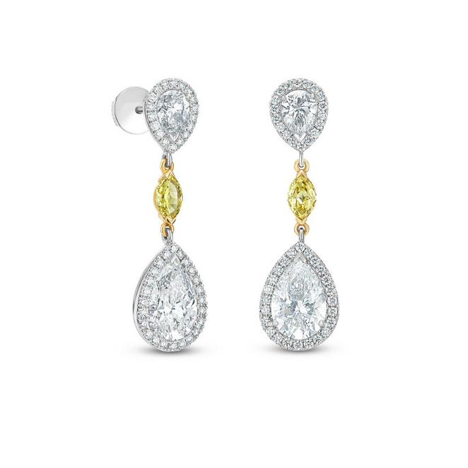 Aura earrings with large pear-shaped diamonds in platinum