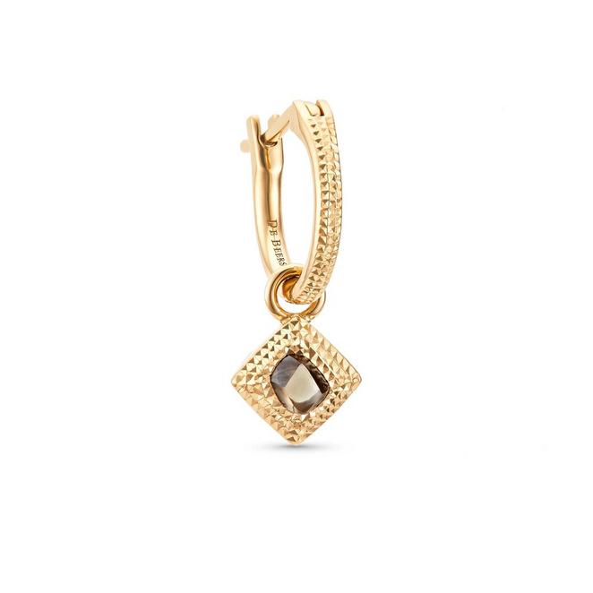 Talisman earring with a rough diamond in yellow gold