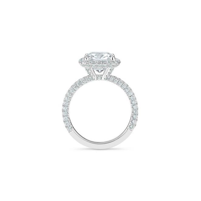 Aura solitaire ring with a large cushion-cut diamond in platinum