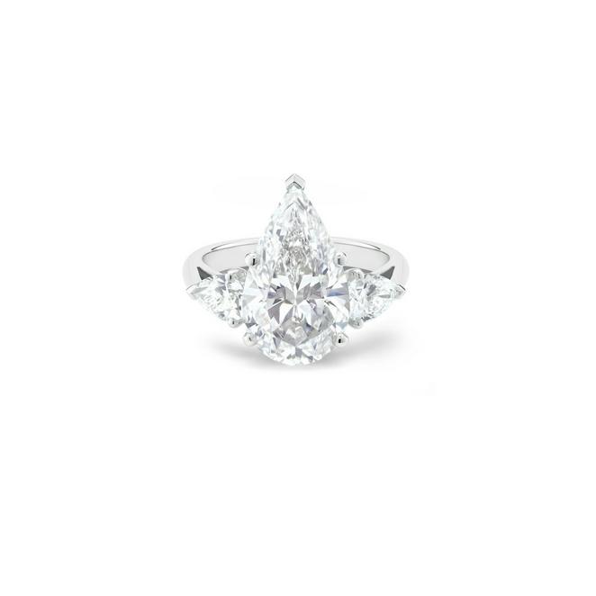 DB Classic solitaire ring with a large pear-shaped diamond and pear-shaped side diamonds in platinum