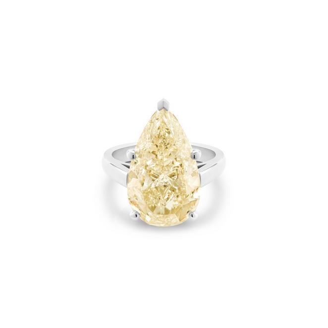 DB Classic solitaire ring with a fancy light yellow pear-shaped diamond in platinum
