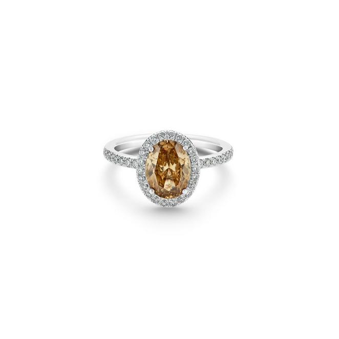 Aura solitaire ring with a fancy colour oval-shaped diamond in white gold