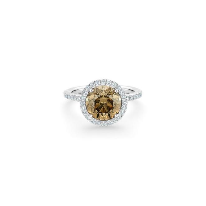 Aura solitaire ring with a fancy coloured round brilliant diamond in platinum