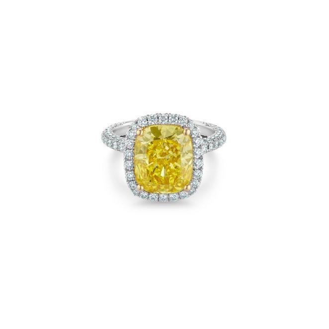 Aura solitaire ring with a fancy vivid yellow cushion-cut diamond in yellow gold and platinum