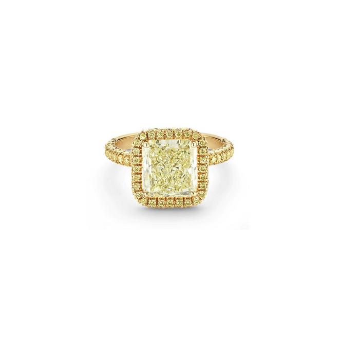 Aura solitaire ring with a fancy yellow radiant-cut diamond in yellow gold