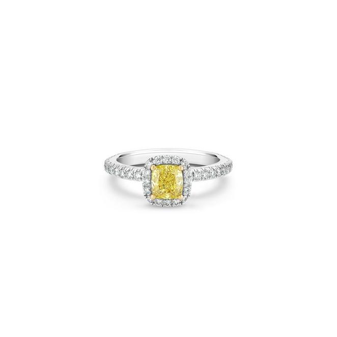 Aura solitaire ring with a fancy yellow cushion-cut diamond in platinum and yellow gold
