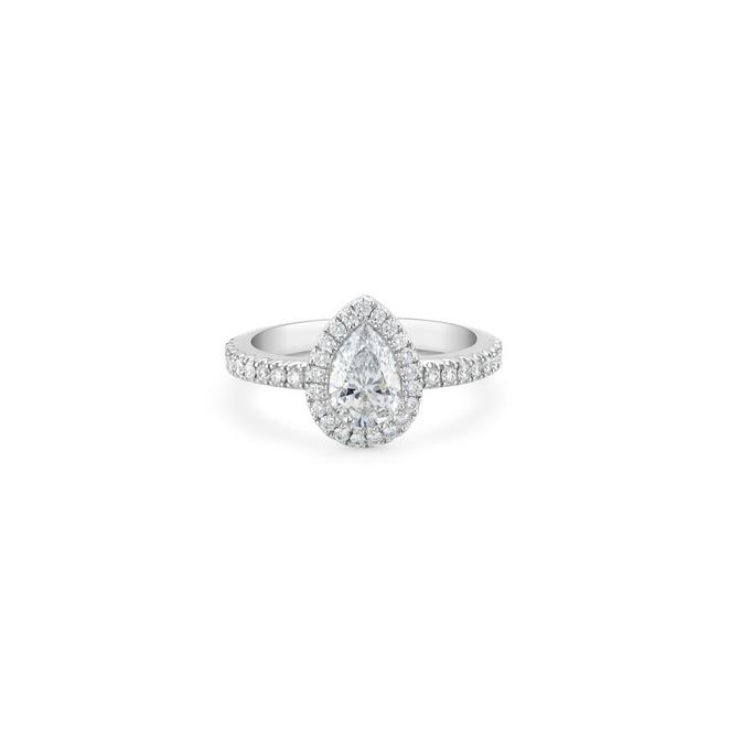 Aura solitaire ring with a pear-shaped diamond in platinum