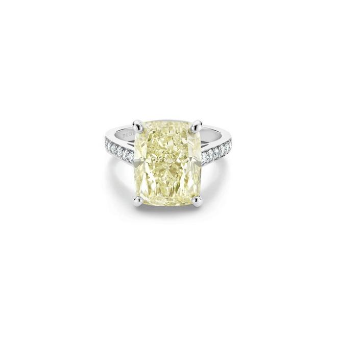 Old Bond Street solitaire ring with a fancy yellow cushion-cut diamond in platinum