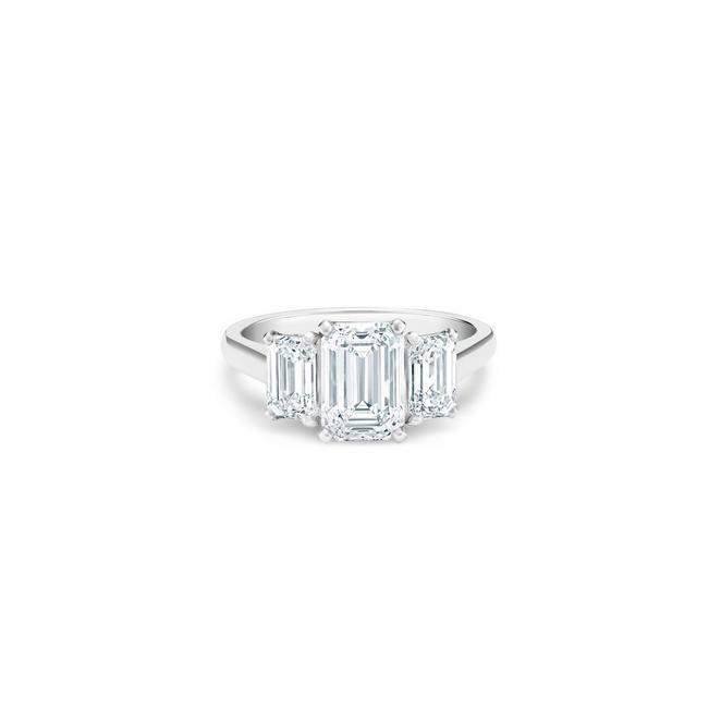 DB Classic trio solitaire ring with emerald-cut diamonds in platinum