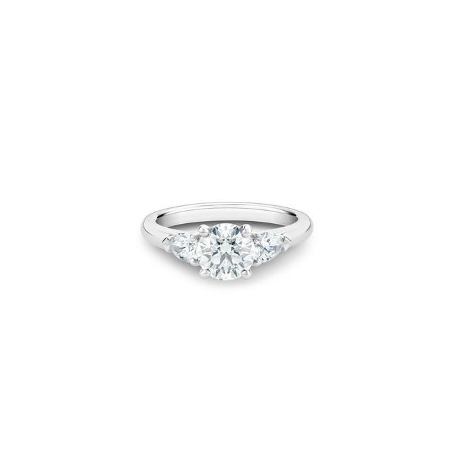 DB Classic solitaire ring with a round brilliant diamond and pear-shaped side diamonds in platinum