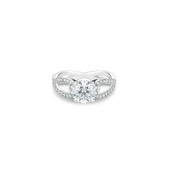 Infinity Heart solitaire ring with a round brilliant diamond in platinum