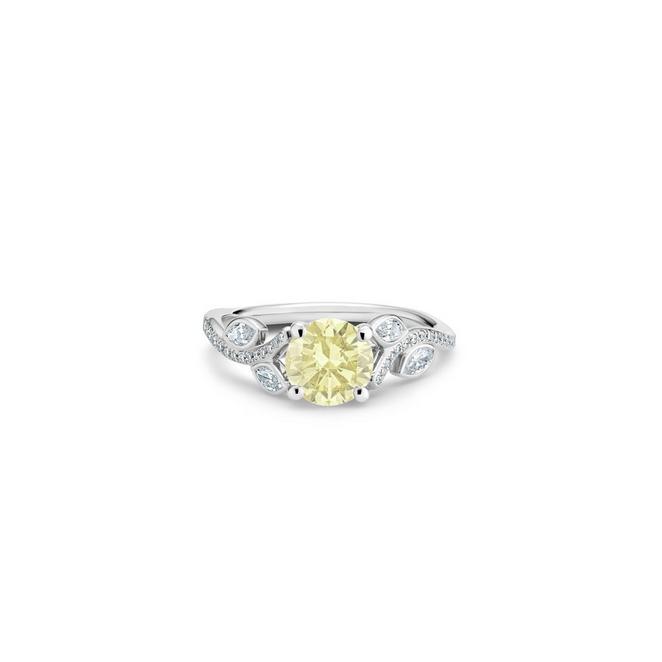 Adonis Rose solitaire ring with a round brilliant yellow diamond in platinum