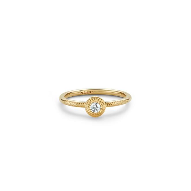 Talisman stacking ring with a round brilliant in yellow gold
