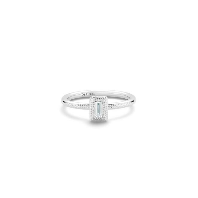Talisman stacking ring with a baguette-cut diamond in white gold