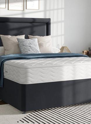 Bed frame against a wall with window frame
