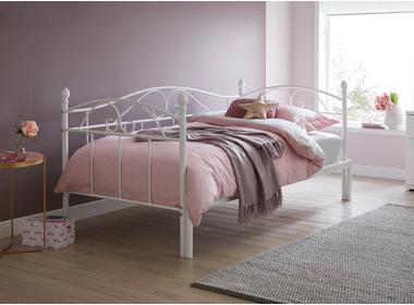 Bed frame against a wall with window frame