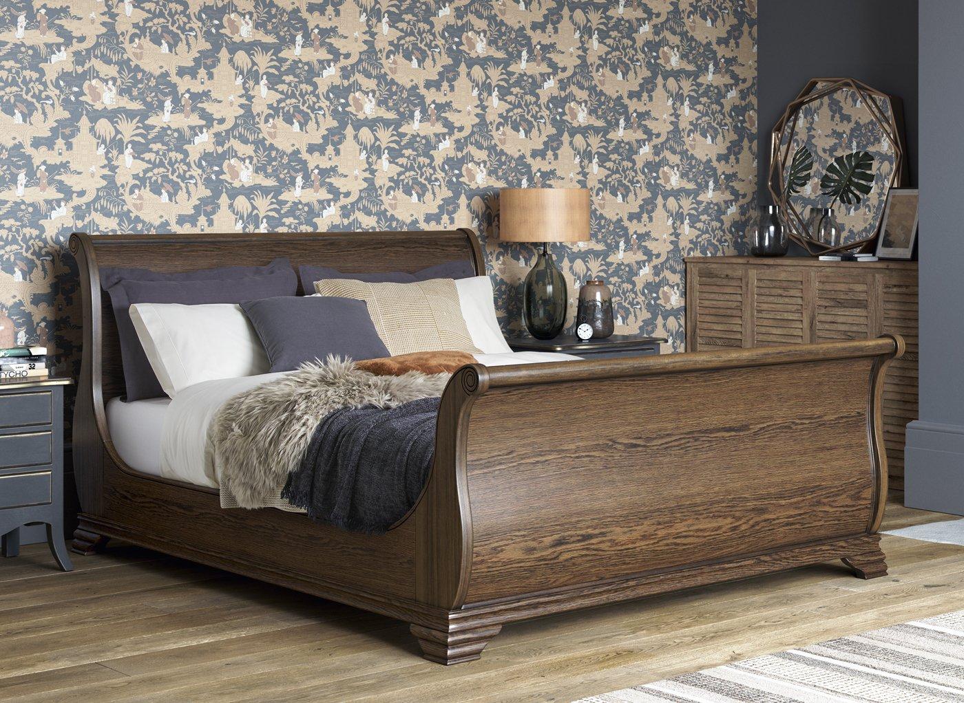 dark wood sleigh cot