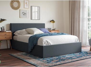 Bed frame against a wall with window frame