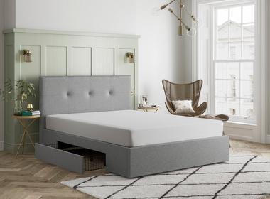 Bed frame against a wall with window frame
