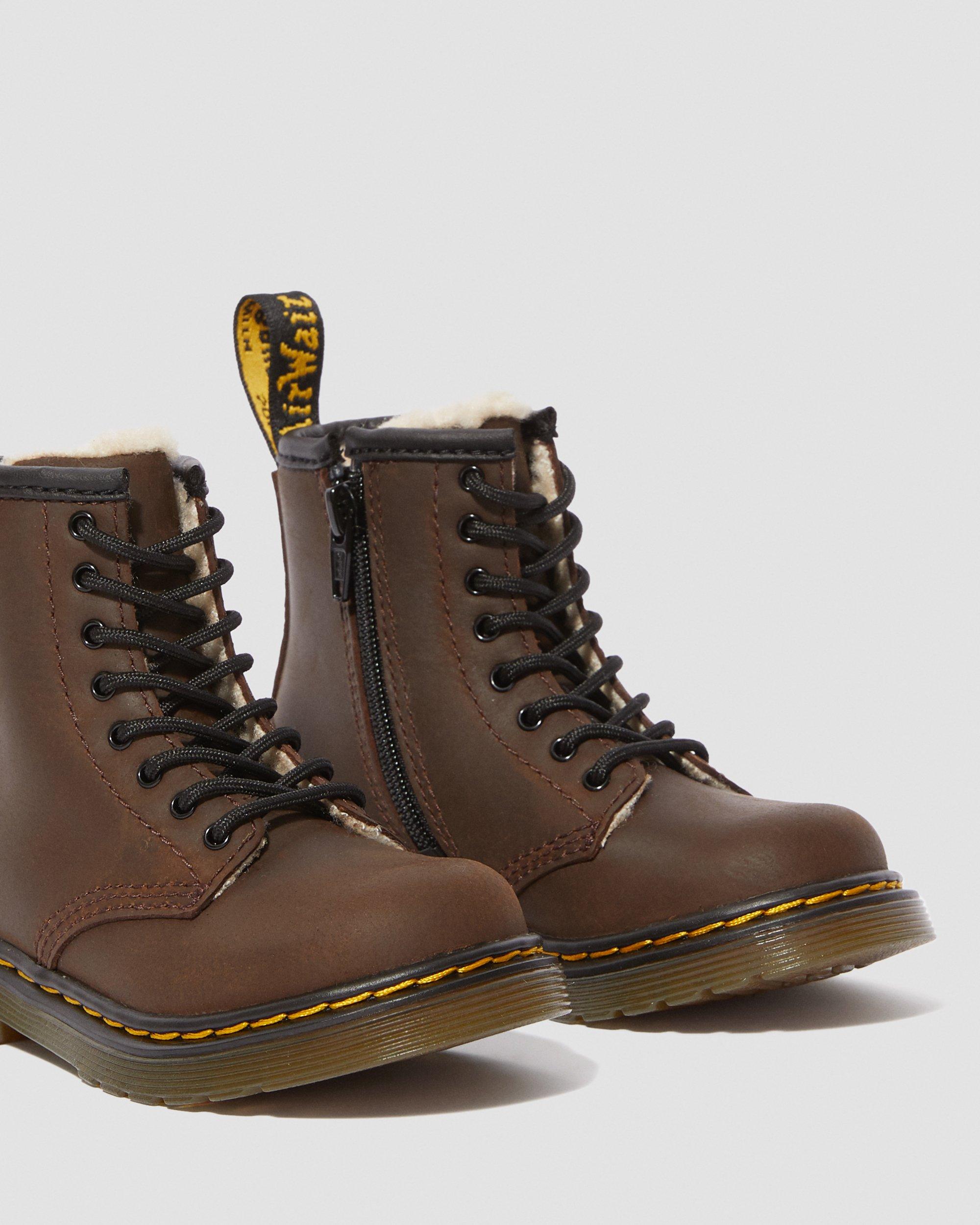 brown fluffy doc martens