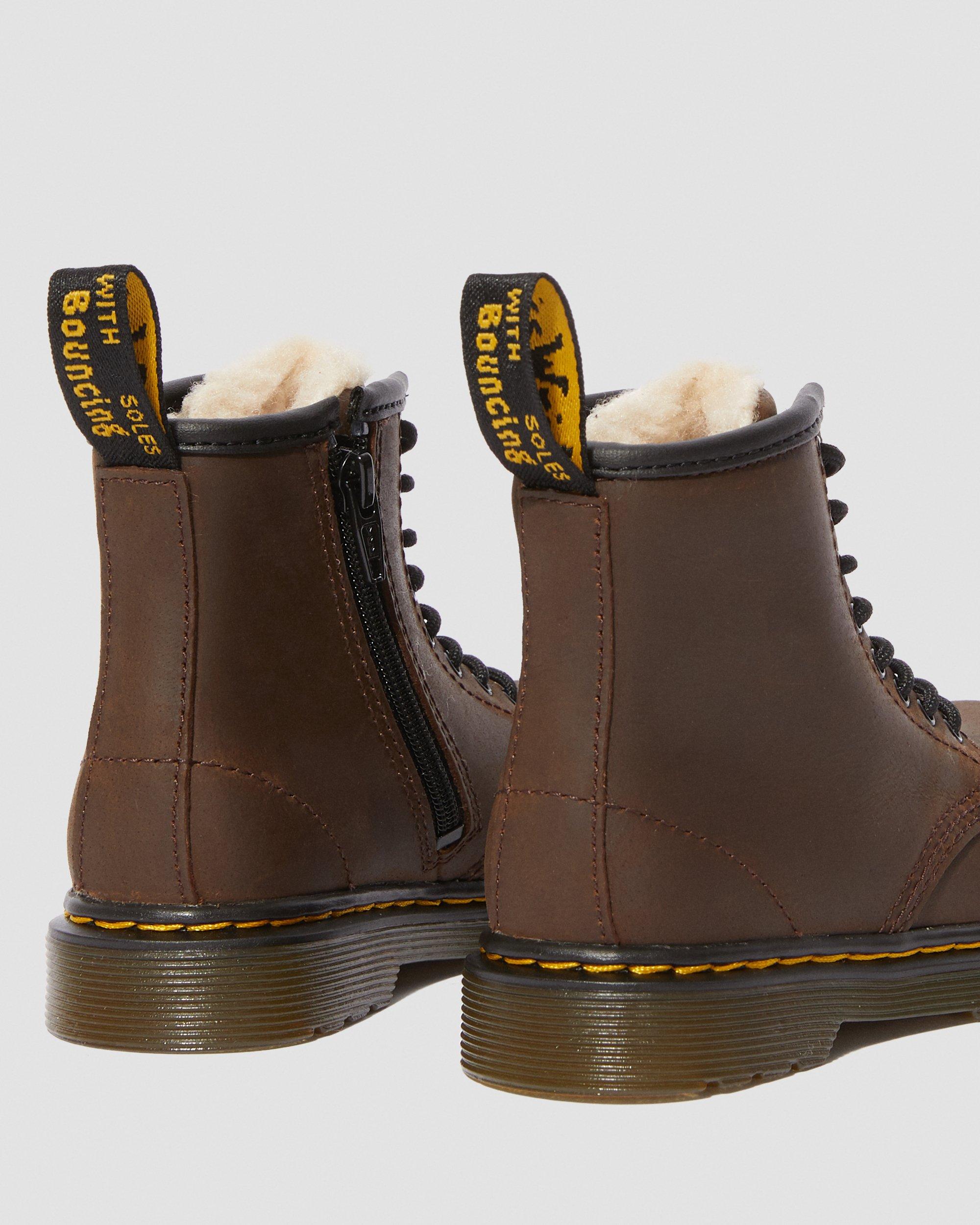 brown fluffy doc martens