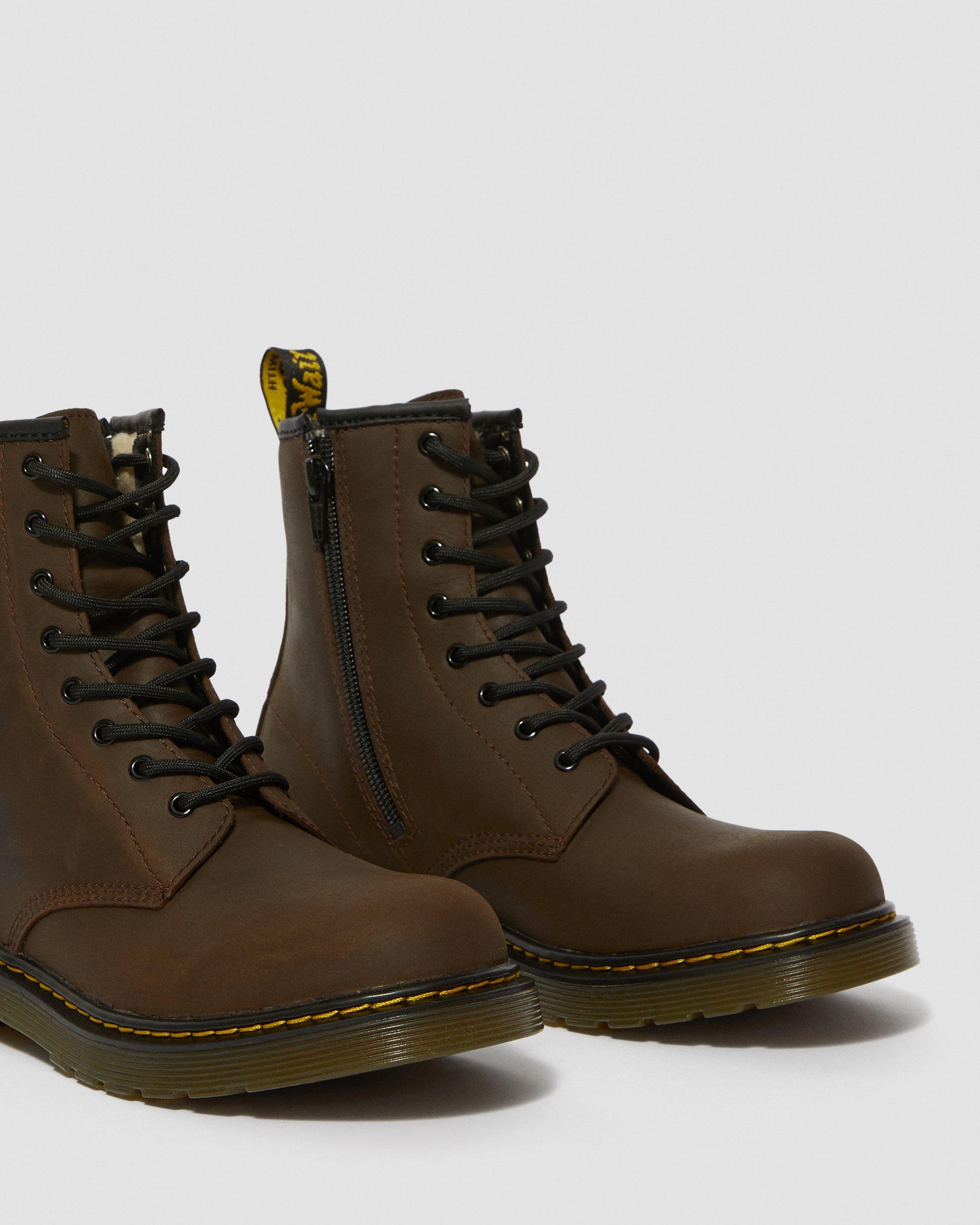 brown fluffy doc martens
